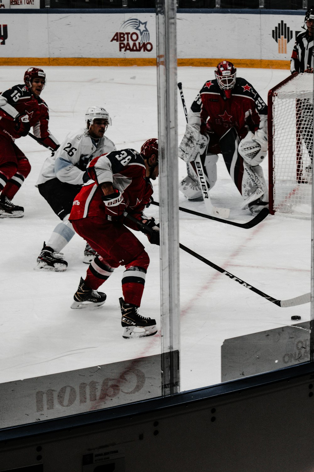 ice hockey players on ice hockey field