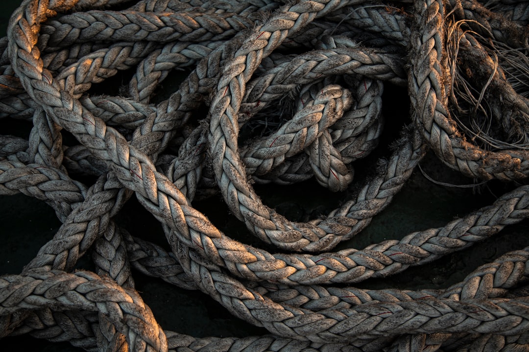brown rope on black surface