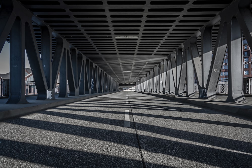 a long bridge with lots of metal beams