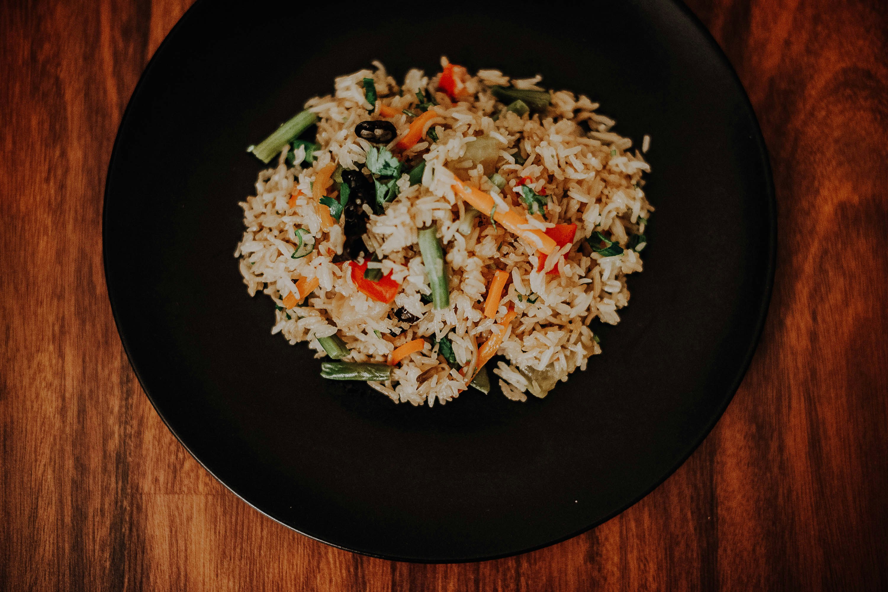black ceramic bowl with food