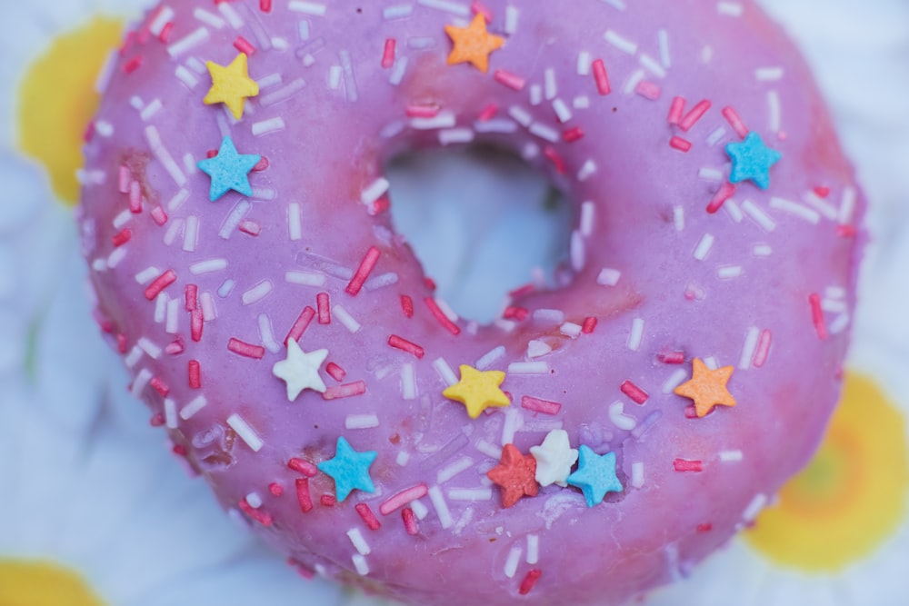 red and white doughnut on white textile