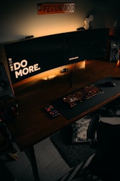 black computer keyboard on brown wooden desk