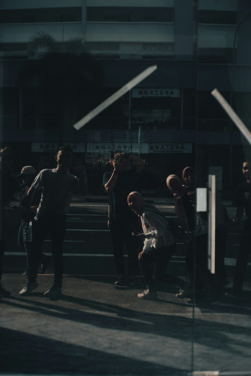 people walking on pedestrian lane during night time