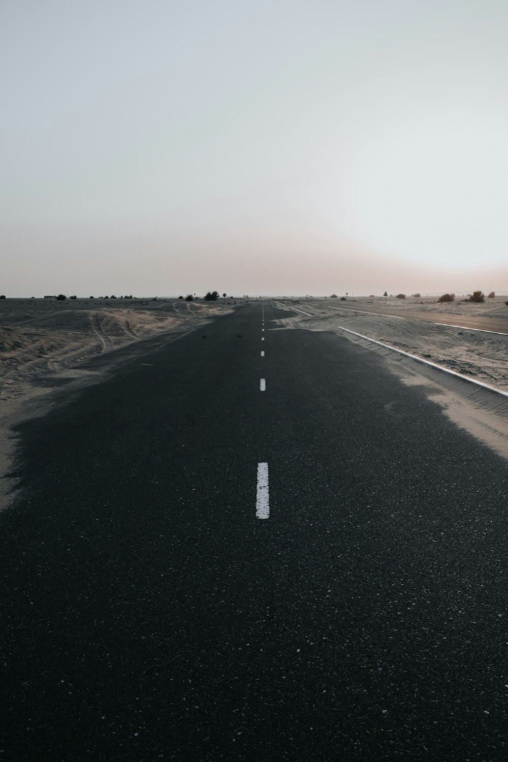 black asphalt road during daytime