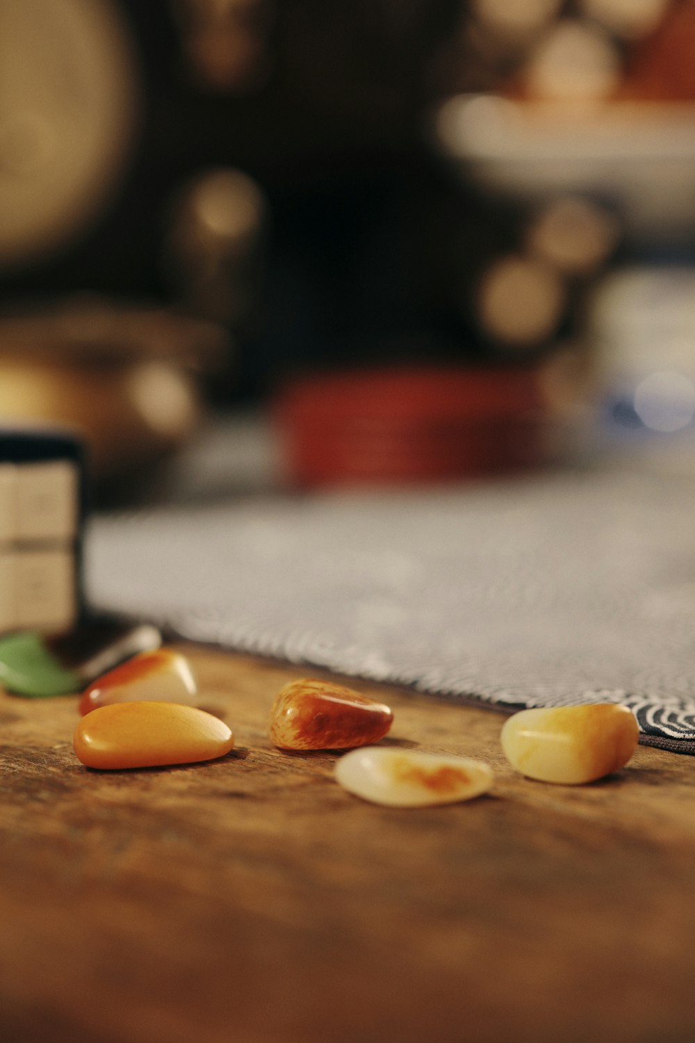 brown and white stones on brown wooden table