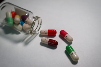 red and white medication pill