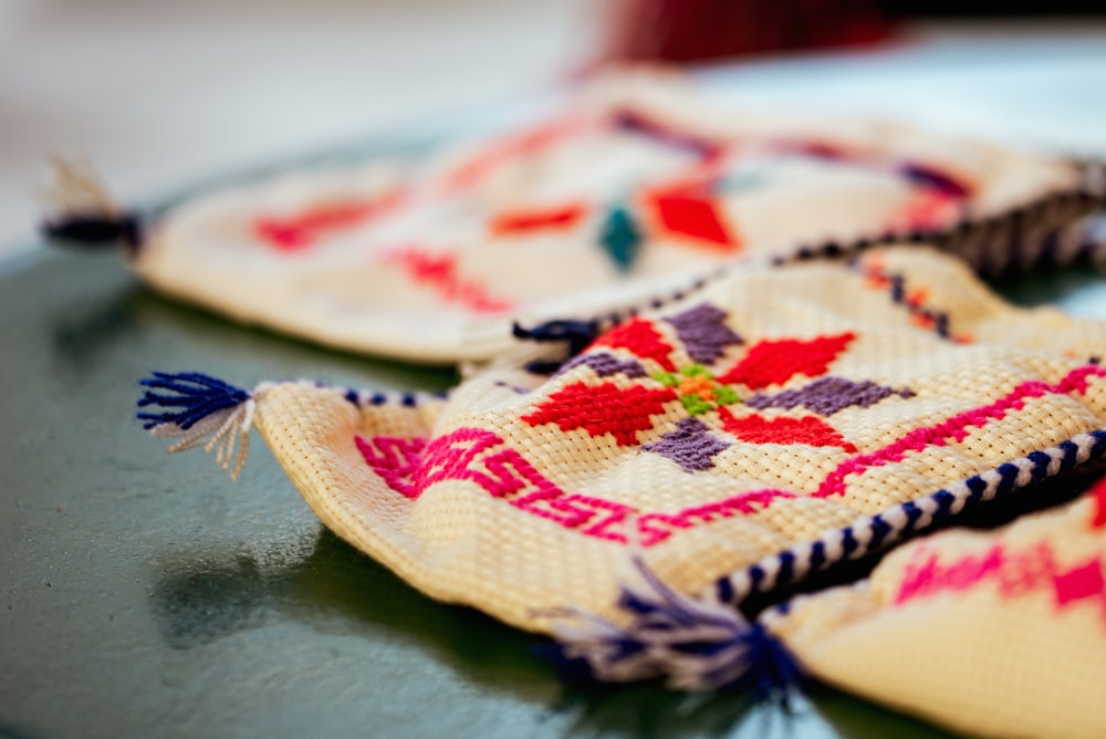 white red and green floral textile