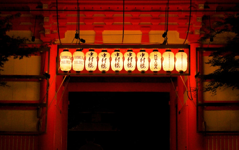 white pendant lamps turned on during nighttime