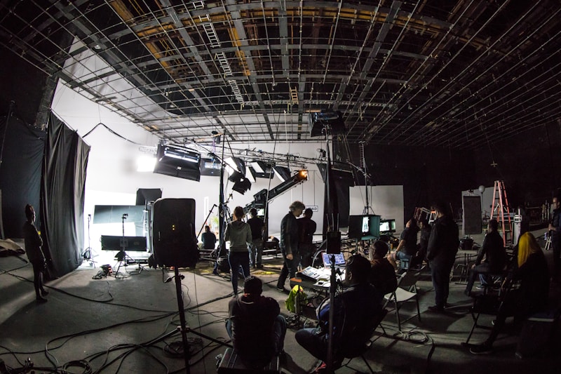 Brand film production with stage lighting and live band performance