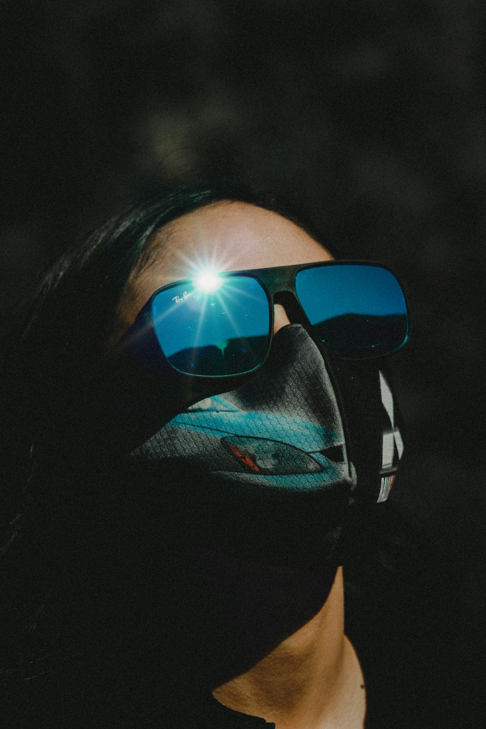 woman wearing black framed sunglasses