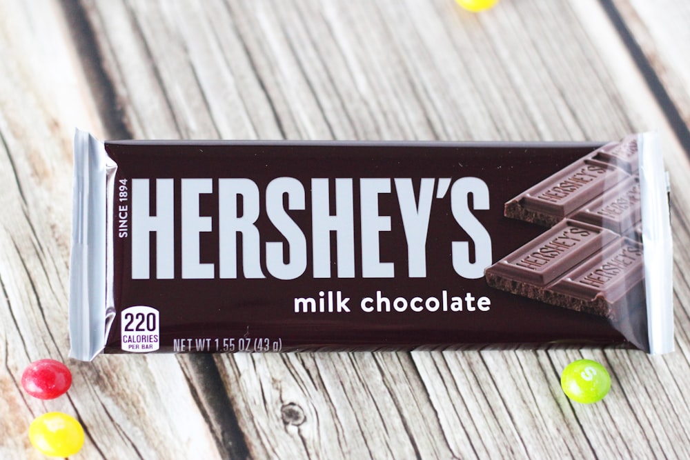 hersheys chocolate bar on gray wooden table