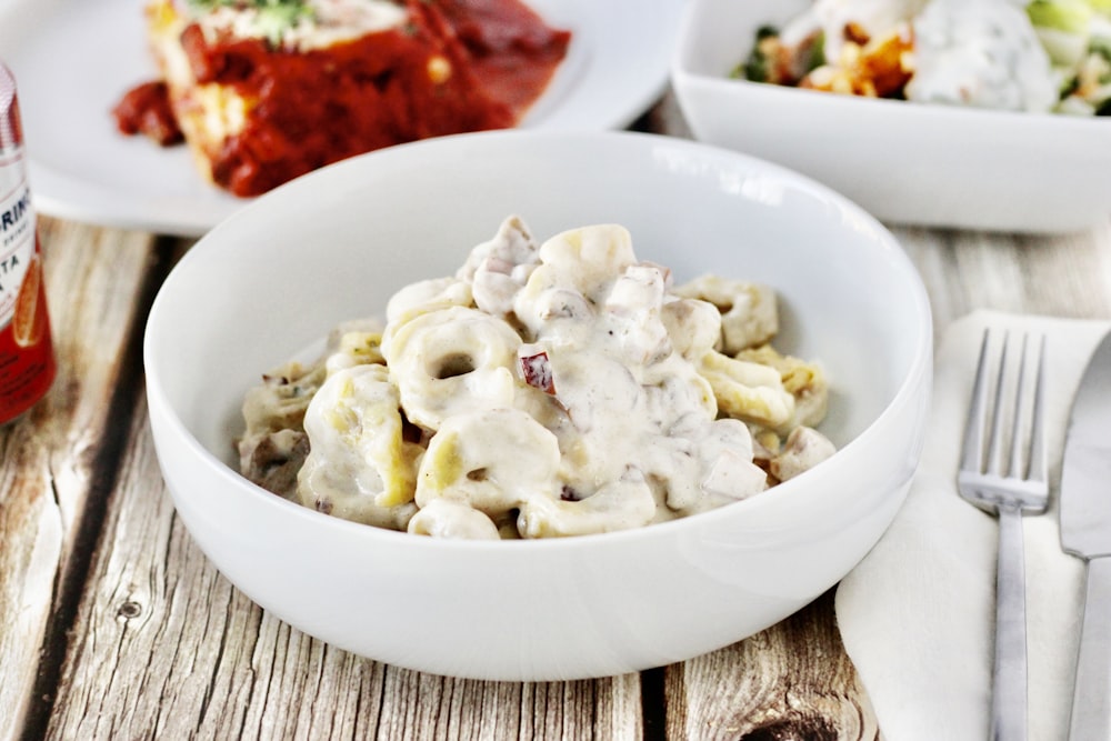 white pasta on white ceramic plate