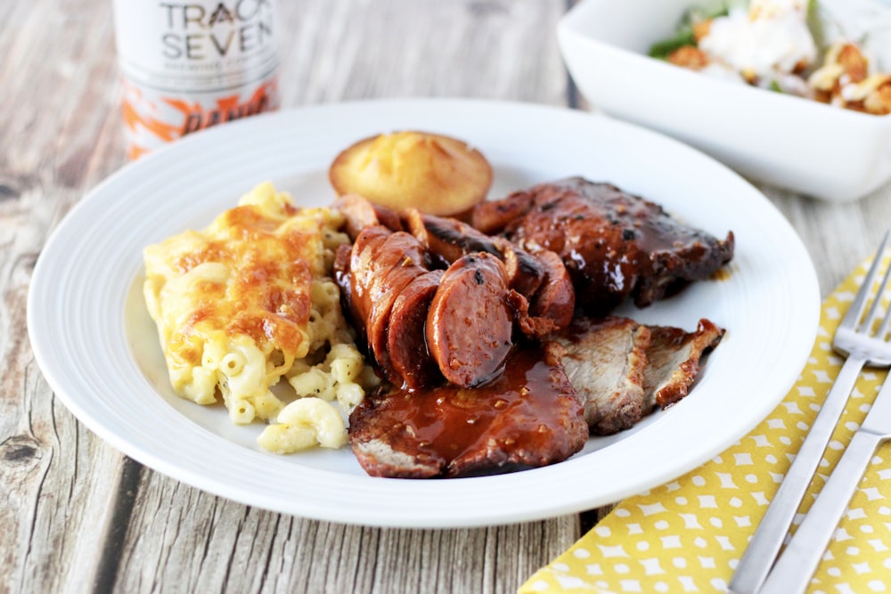 cooked meat on white ceramic plate