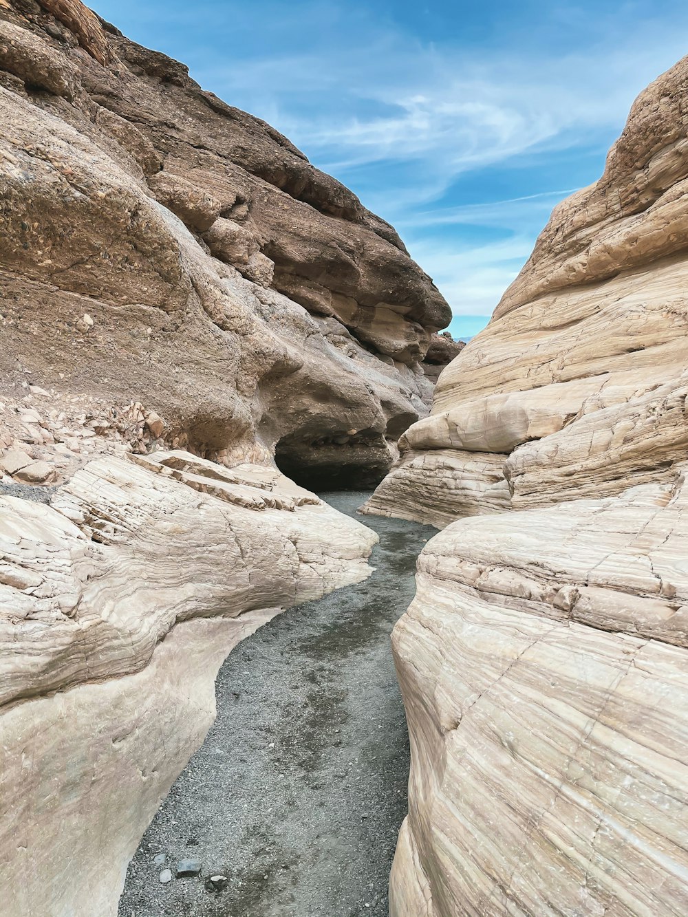 a narrow river cuts through a narrow canyon