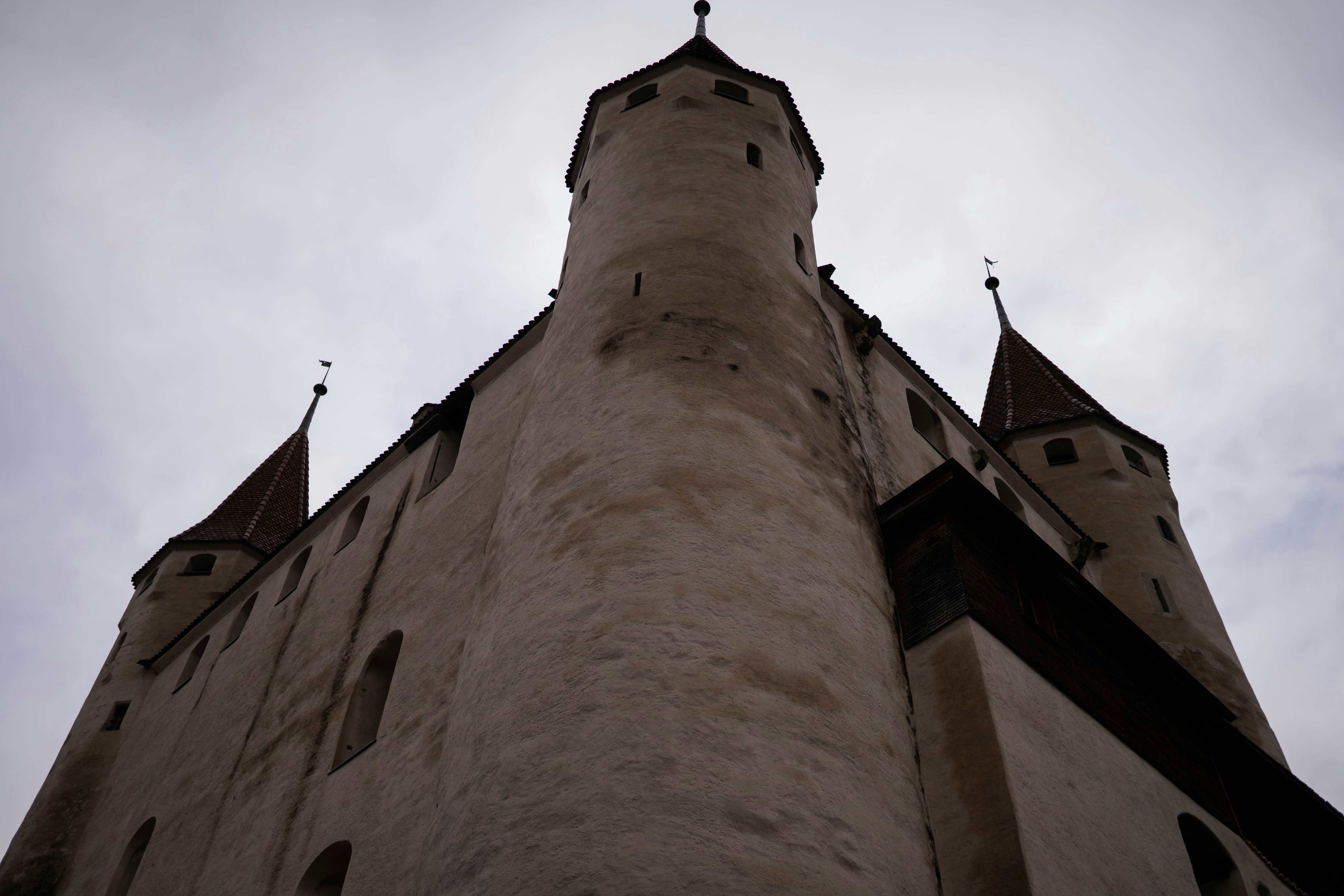 a tall tower with a clock on the top of it, 