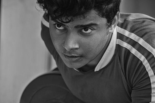 A powerful action shot of a sports player mid-motion, showcasing intensity and focus.