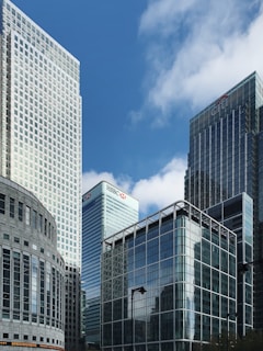 white and gray concrete building under blue sky during daytime