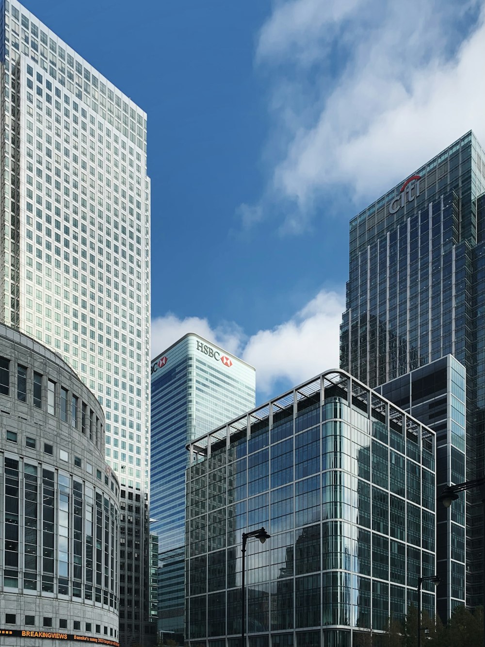 white and gray concrete building under blue sky during daytime