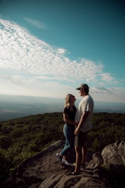 A couple on a romantic getaway in a scenic location.