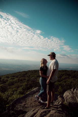 Happy couple enjoying a scenic view on their vacation.
