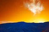 Vibrant color graded landscape showcasing a golden hour mountain vista.