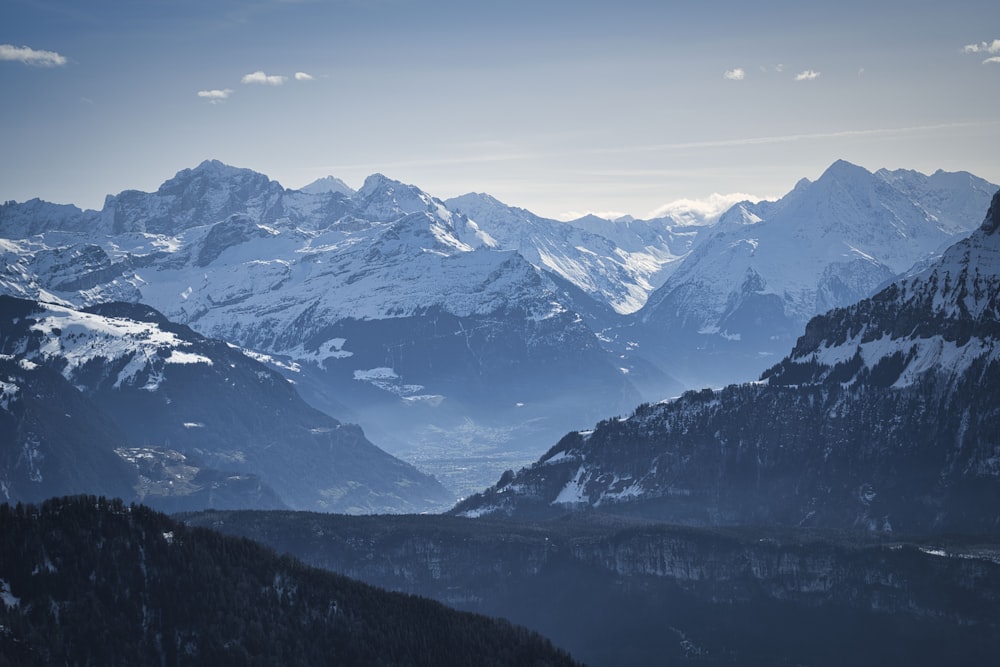 snow covered mountains during daytime