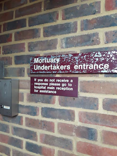 black and white wall mounted signage