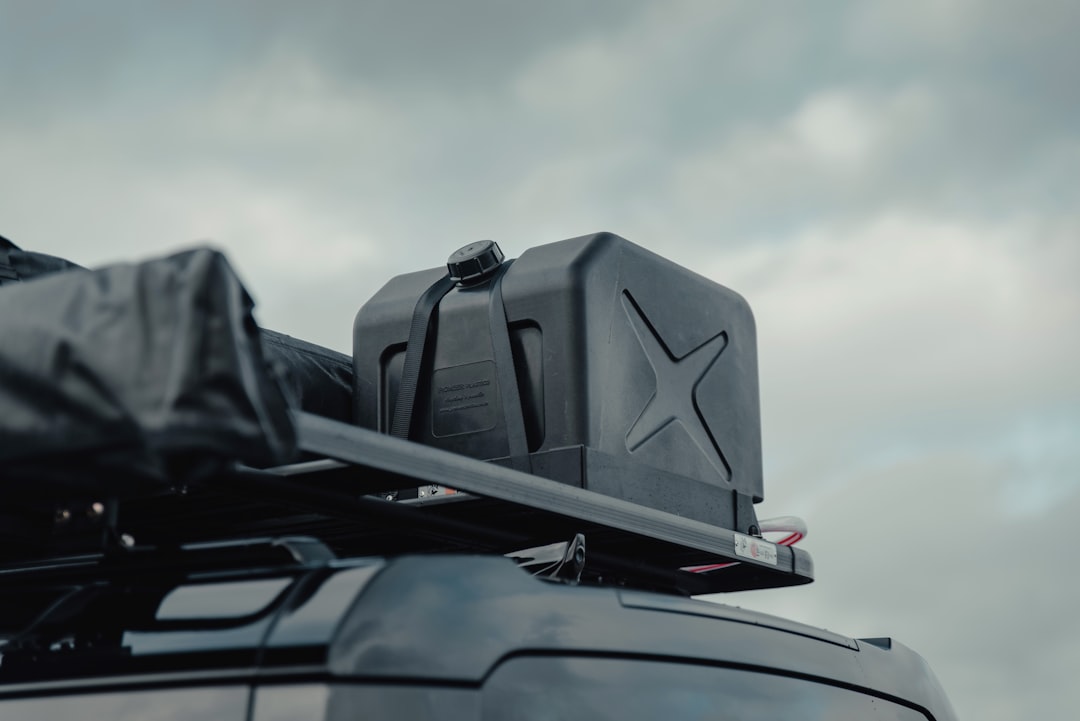 black backpack on car dashboard