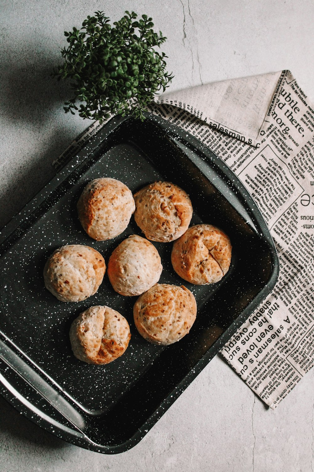 brown cookies on black tray