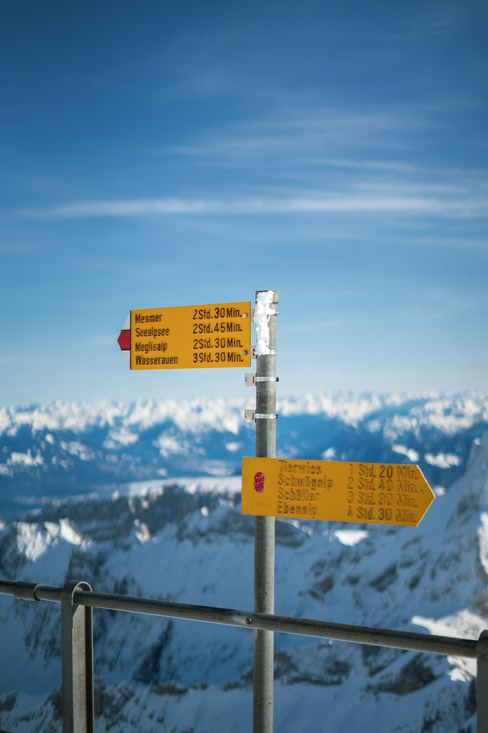 white and yellow road sign