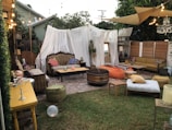 An outdoor setting with comfortable seating and timeless decor.