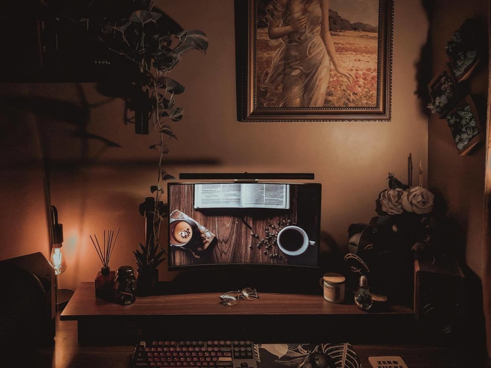 black and silver vintage radio on brown wooden desk