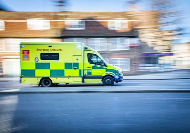 yellow and white van on road during daytime