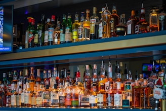 assorted glass bottles on shelf