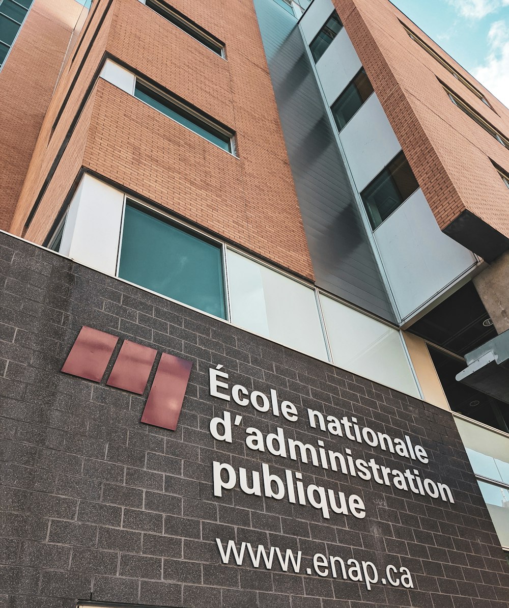 a brick building with a sign on the side of it