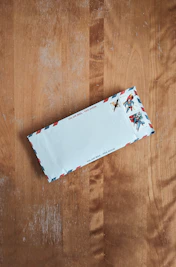 white plastic pack on brown wooden table