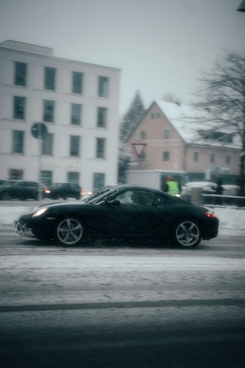 black coupe on road during daytime