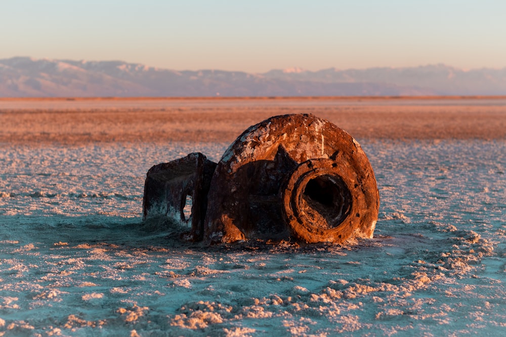 brown and green concrete structure on blue sea water during daytime