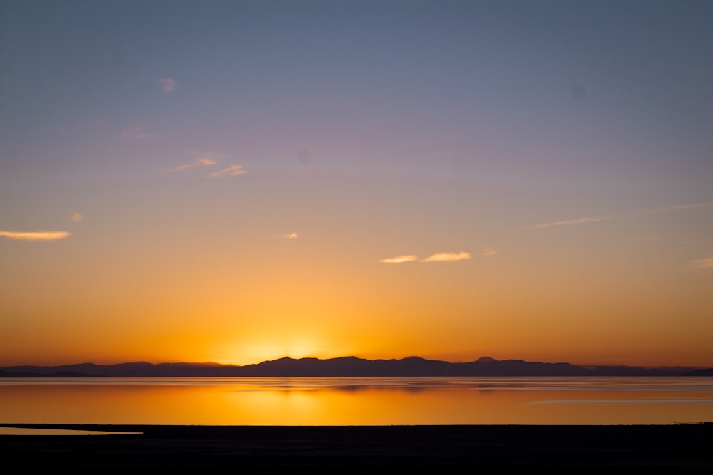 silhouette of mountain during sunset