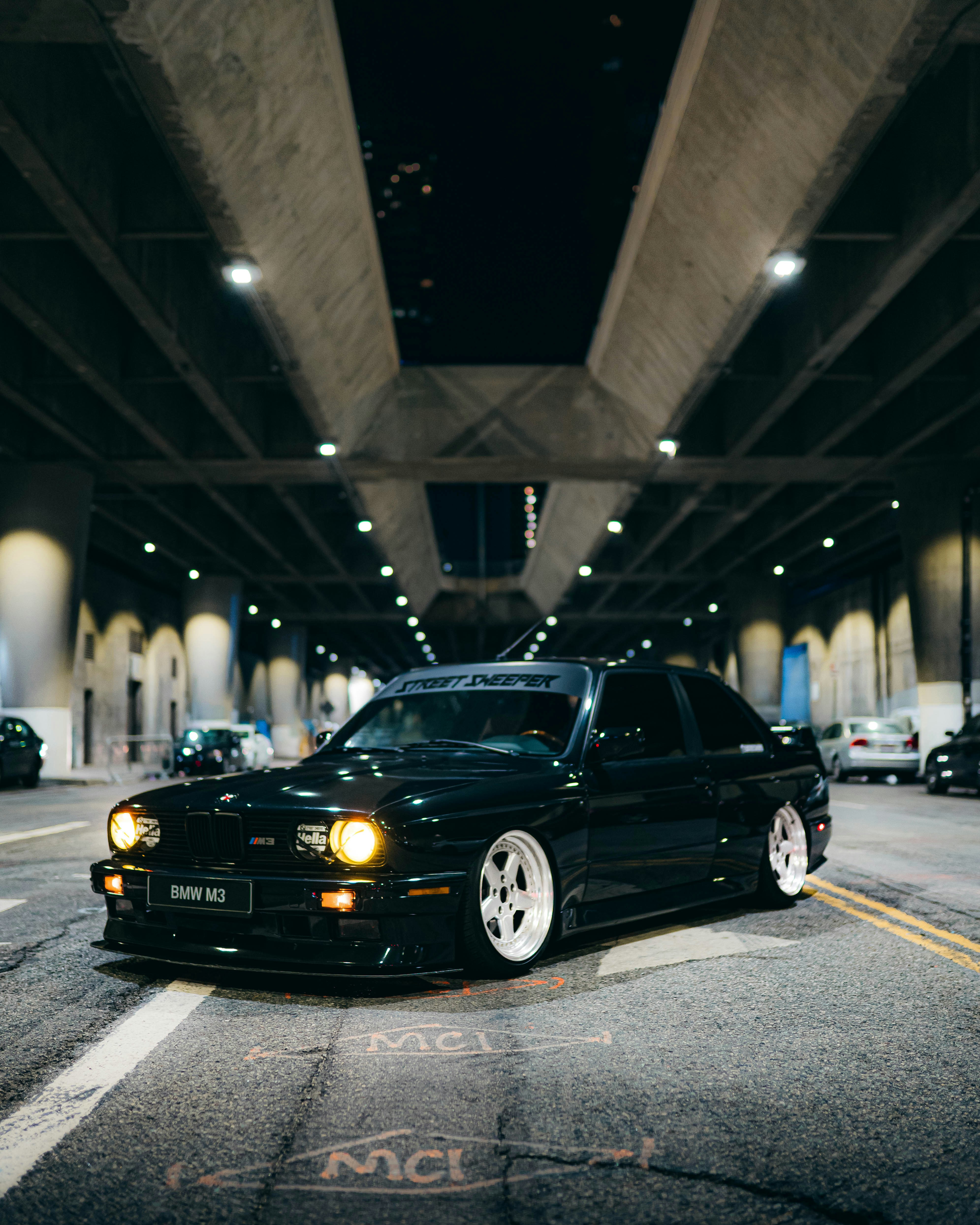 black bmw m 3 on road during night time
