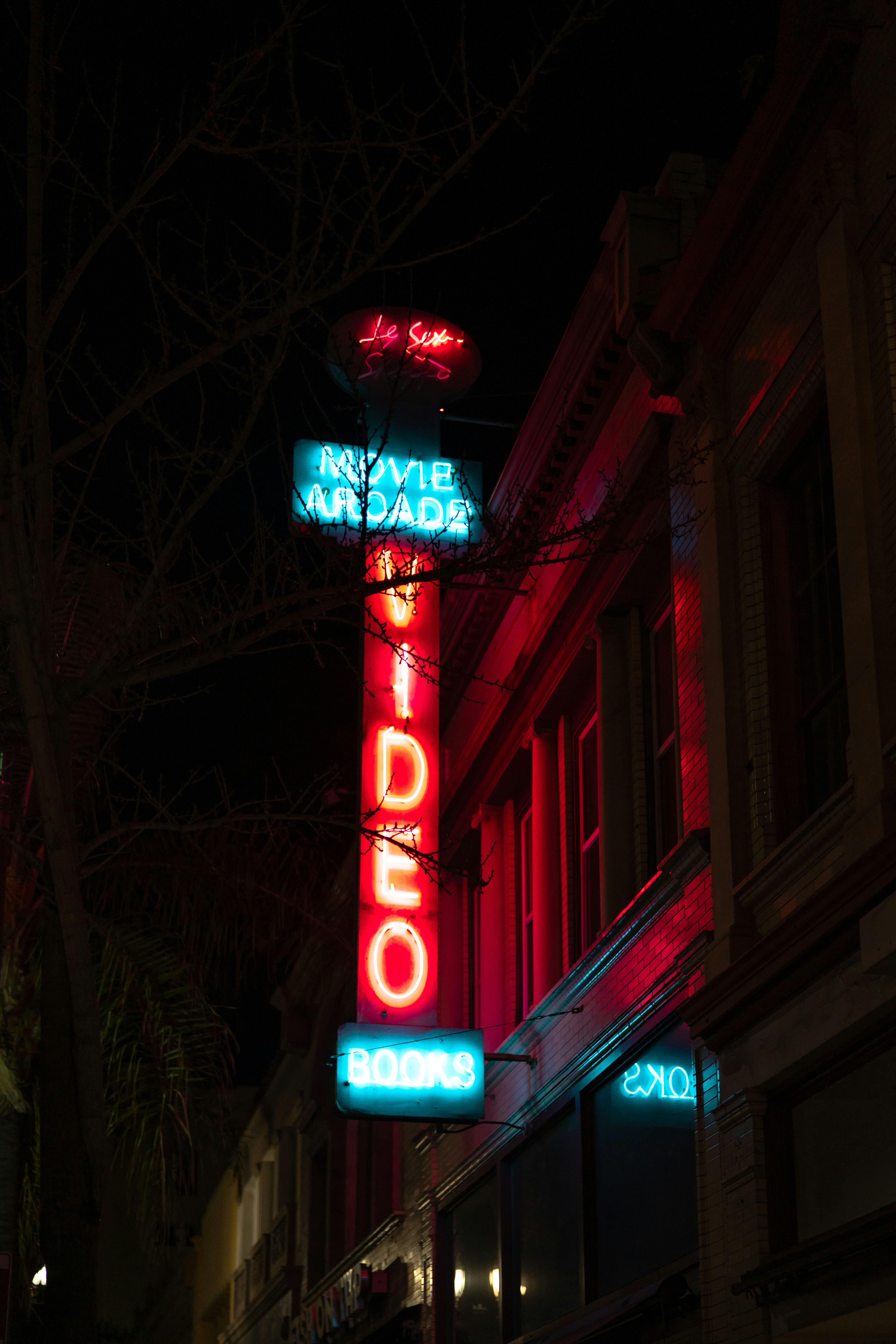 red and white open neon signage