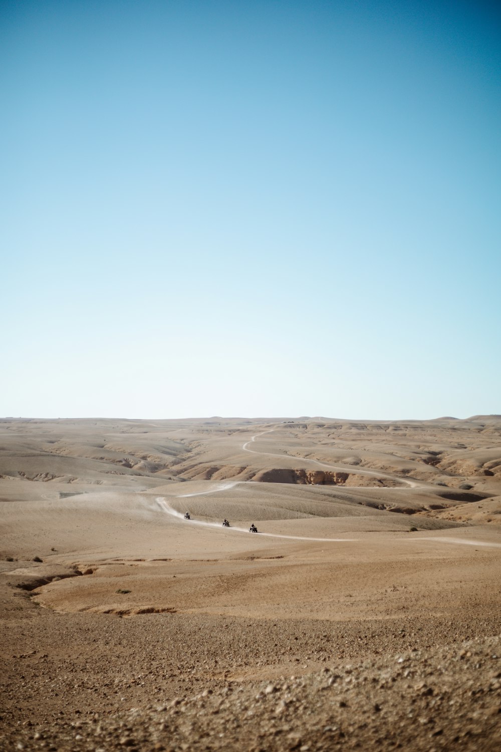 brown sand under sunny sky