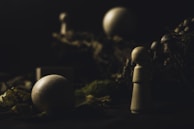 Close-up of a handcrafted game environment showcasing moody shadows and rich textures.