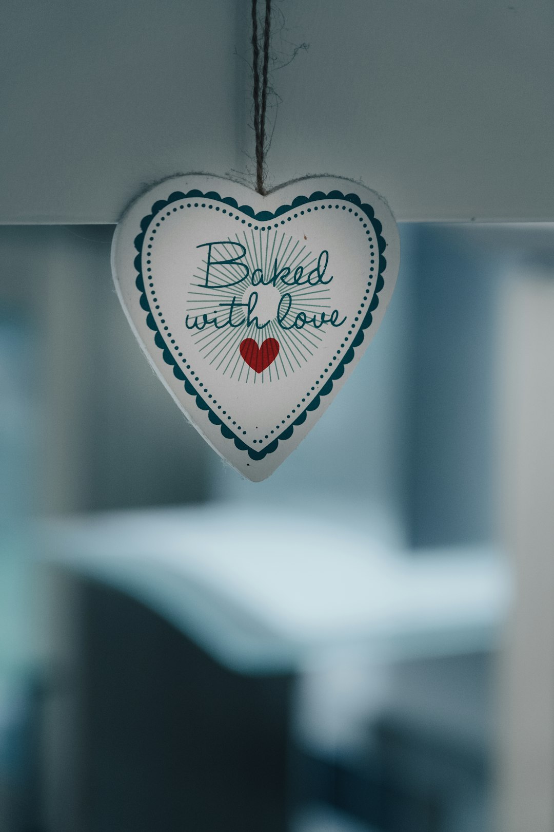 gold and white heart shaped pendant