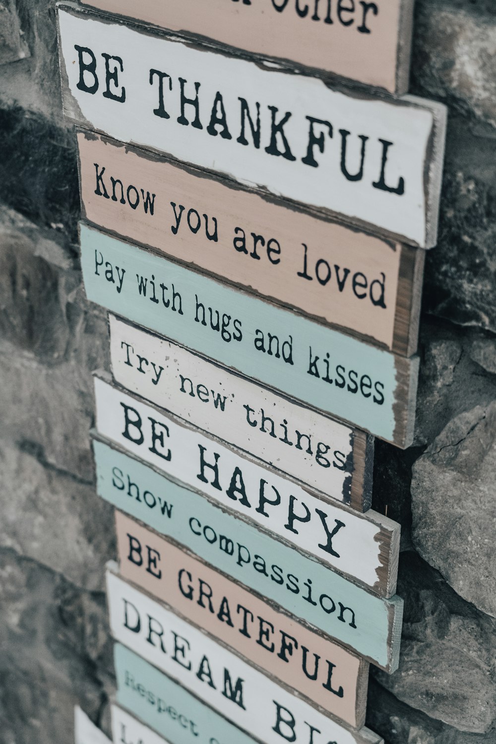 white and brown wooden signage