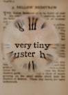 a close up of a clock on a piece of paper