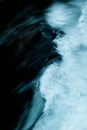 water waves on black background