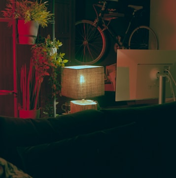 Cozy workspace interior with warm lighting and plants