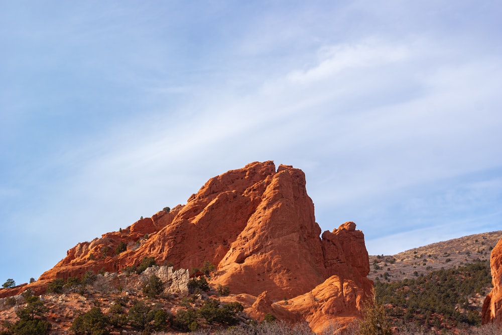 brown rock formation under blue sky during daytime