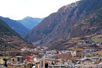 aerial view of city near mountain during daytime